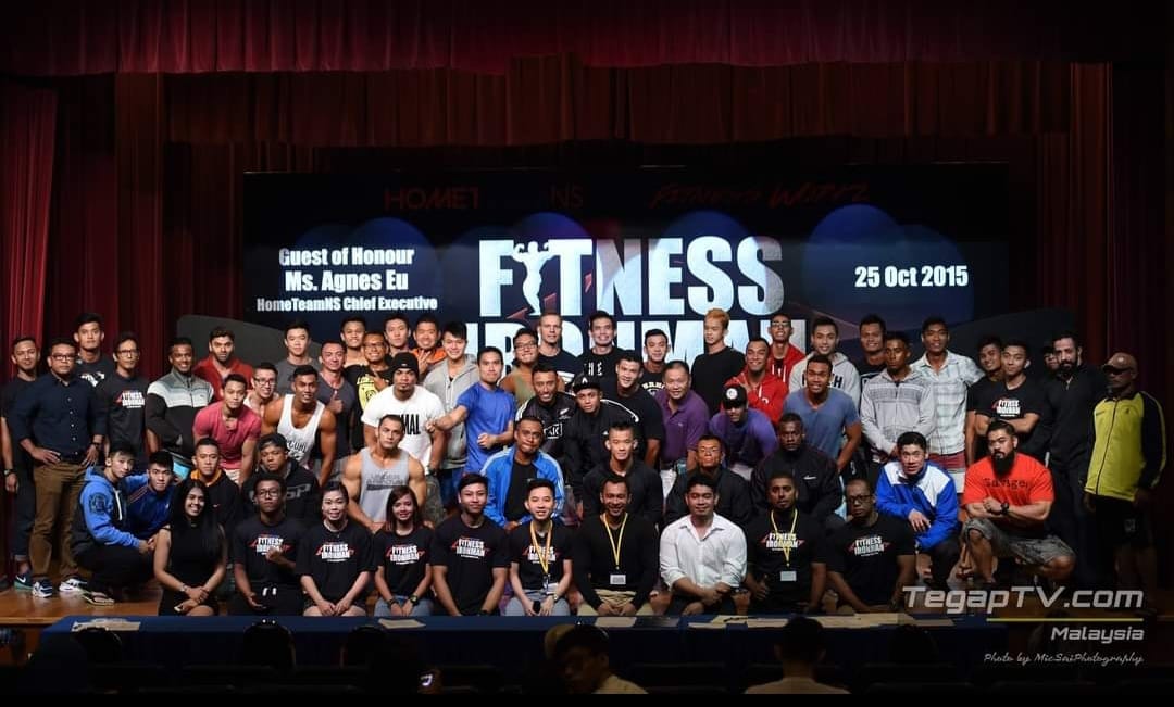 Fauzi (first row, third from right) joins Fitness Ironman competitors, HomeTeamNS staff and volunteers for a celebratory group shot after the inaugural event.
